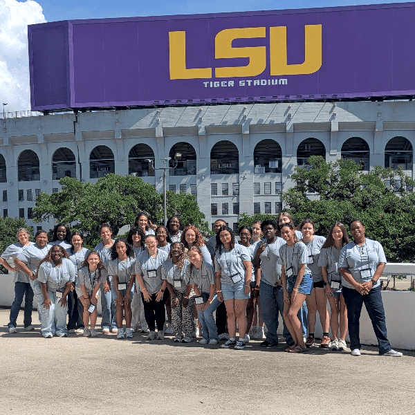 Shaping Futures Attendees in front of Tiger Stadium